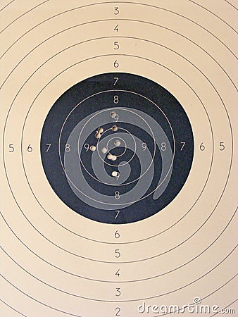 Holes in a shooting practice target close up Stock Photo
