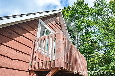 Holiday apartment - wooden cottage in forest Stock Photo