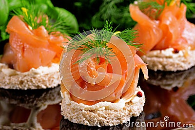Holiday appetizer with salmon canapes Stock Photo