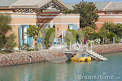 Holiday bungalows on a river Stock Photo