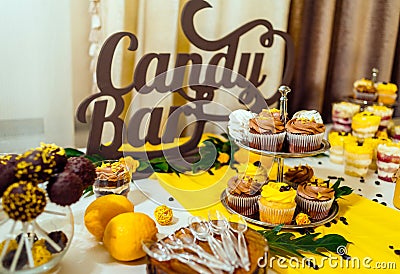 Holiday candy bar. Candy bar served with cupcakes with chocolate. Stock Photo