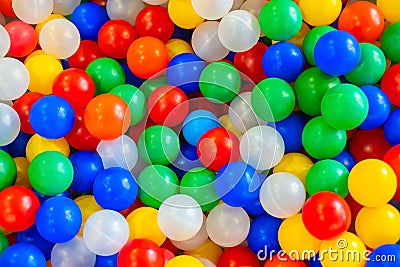 Holiday, children`s party, a games room, a box filled with small colored balls Stock Photo