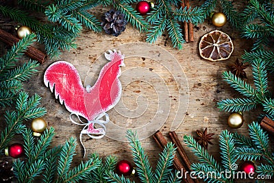 Holiday Christmas background. Fire Rooster symbol of the year. T Stock Photo