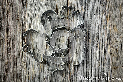 Holiday Cookie Cutters on Rustic Wood Stock Photo