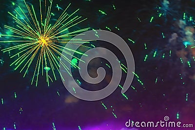 Holiday fireworks with sparks on dark sky as star, comet in universe. Festive background Stock Photo
