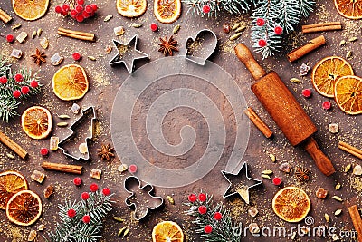 Holiday food background for baking gingerbread cookies with cutters, rolling pin and spices on table top view.Christmas recipe. Stock Photo