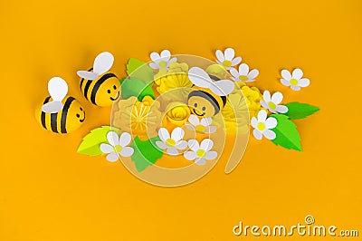 Holiday honey. Yellow background. Handicraft bee painted egg. Easter. Origami paper flower. Lettering Stock Photo