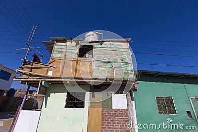 Holiday houses with hanging clothes in Mancora, Peru Editorial Stock Photo