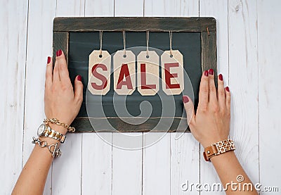 Holiday Sale. Female hands with jewelry. Fashion accessories Stock Photo