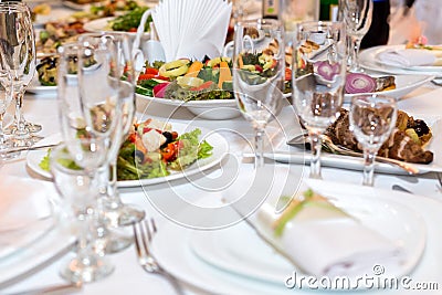 Holiday table served with various dishes Stock Photo