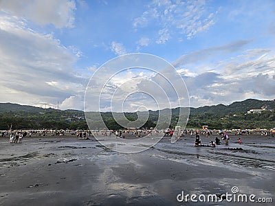 Holiday Vibes Under a Dramatic Sky Editorial Stock Photo