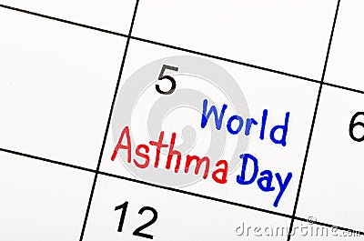 The Holiday World Asthma Day - 5 fifth May Month Hand Writing on Desk Calendar Stock Photo