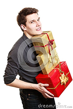 Holiday. Young man giving presents gifts boxes Stock Photo