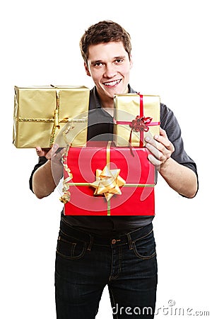 Holiday. Young man giving presents gifts boxes Stock Photo