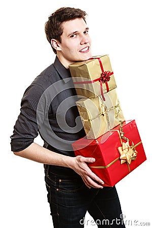 Holiday. Young man giving presents gifts boxes Stock Photo