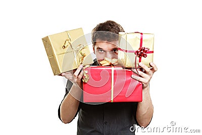 Holiday. Young man giving presents gifts boxes Stock Photo