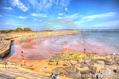 Holidaymakers enjoying the heatwave in Dawlish Warren beach Devon on a summer day in 2013 Editorial Stock Photo