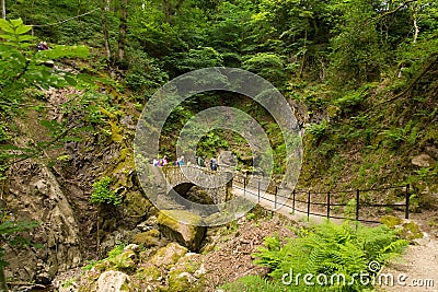 Holidaymakers and tourists Aira Force waterfall Ullswater Valley Lake District Cumbria England UK Editorial Stock Photo