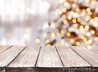 Holidays background with light spots, bokeh and vintage wooden tabletop Stock Photo