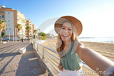 Holidays in Calabria. Selfie girl on Crotone promenade in Calabria, southern Italy Stock Photo