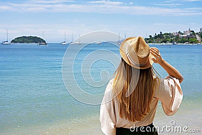 Holidays on tropical island. Traveler girl on Jurere beach, Florianopolis Santa Catarina Island, Brazil Stock Photo