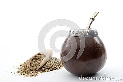 Holistic medicine, detox cleanse and natural stimulant concept with traditional drinking cup, dry yerba mate tea leafs with a Stock Photo