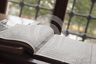 Holly quran by window in a mosque Stock Photo