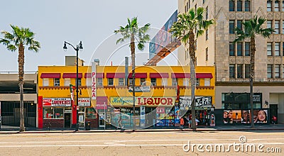 Small pizzeria, liquor store, and souvenir shop on the Hollywood Walk of Fame, street view. Typical architecture, bright Editorial Stock Photo