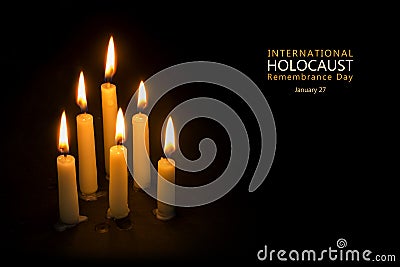 Holocaust Remembrance Day, January 27, candles against black background Stock Photo