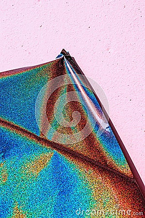Holographic glitter texture. Rainbow spectrum gradient. Shiny abstract background. Stock Photo