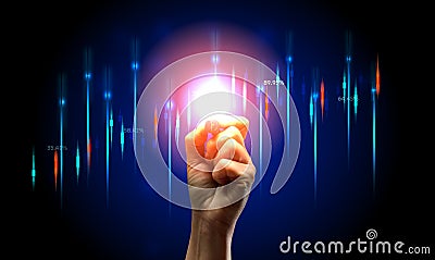 Holographic graph with growing indicators and a woman's hand with a marker on a blue background Stock Photo