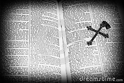 Holy Bible Page Open With A Silver Cross On Page Stock Photo