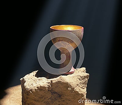 Holy Grail Sitting on a Rock Stock Photo