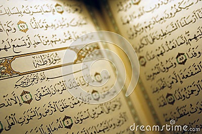 Holy Koran book & rosary Stock Photo