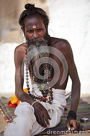 Holy man with bindi and buddhist prayer beads Editorial Stock Photo