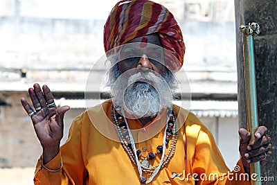Holy man outside the Jagdish Mandir temple in Udaipur, India Editorial Stock Photo