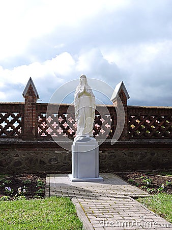 Holy Mary statue in Sveksna town church yard, Lithuania , Lithuania Stock Photo