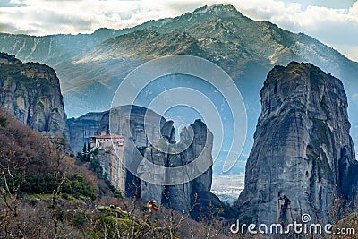 The Holy Monastery of Roussanou among the steep cliffs, mountains panorama, Kalampaka, Trikala, Thessaly Stock Photo