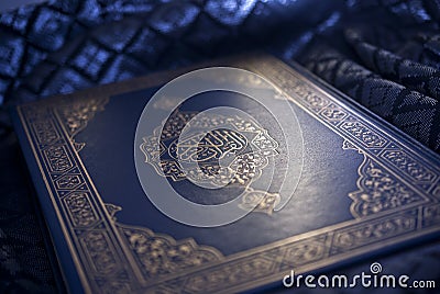 Celestial Illumination upon the Sacred Text of the Holy Quran Stock Photo