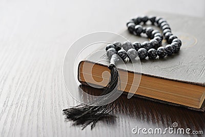 Holy Quran with beads Stock Photo