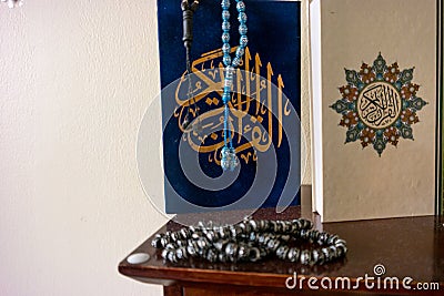 Holy Quran in blue and gold colors with Arabic prayers Stock Photo