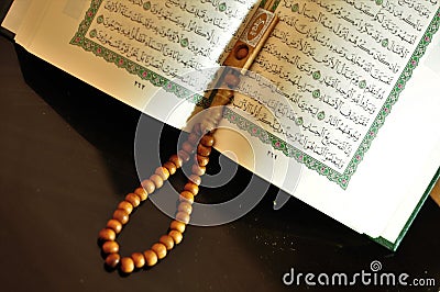 The holy Quran with tasbih/rosary beads Stock Photo