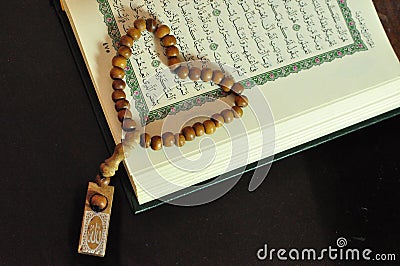 The holy Quran with tasbih/rosary beads Stock Photo
