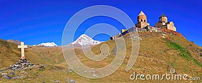 Holy Trinity Church Panorama, Kazbegi, Georgia Stock Photo