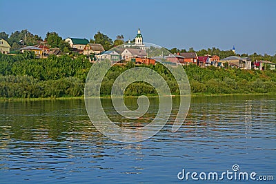 Holy Trinity Church among rural houses on Oka river in Kasimov city, Russia Stock Photo