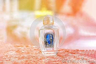 Holy water in a small bottle. Sunlight. The miracle concept. Lourdes, France Stock Photo