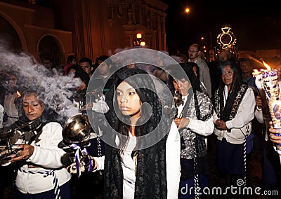 Holy Week procession of the Paso (Platform or Throne) of the Virgin Mary and the Child through the streets at night Editorial Stock Photo