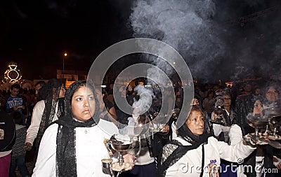 Holy Week procession of the Paso (Platform or Throne) of the Virgin Mary and the Child through the streets at night Editorial Stock Photo