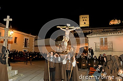 Holy Week in Zamora on the night of Holy Wednesday, procession of the Brown Layers of the Brotherhood of Penitence of the Holy Chr Editorial Stock Photo