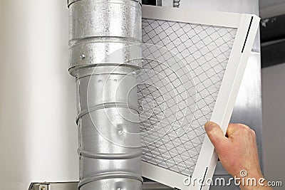 Home Air Filter Replacement Stock Photo